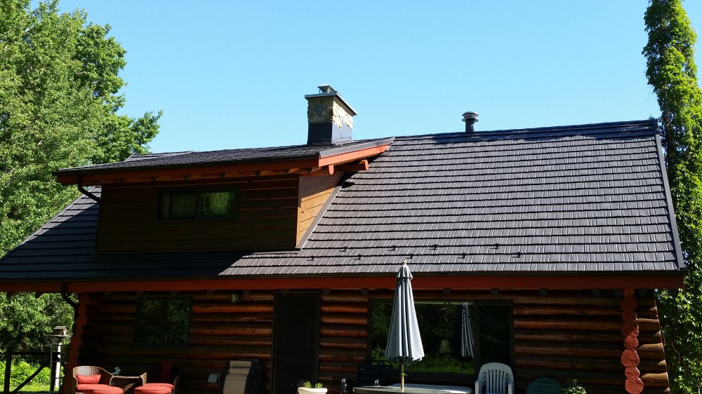 Photo By Renoteck Roofing. Iron Wood Shake