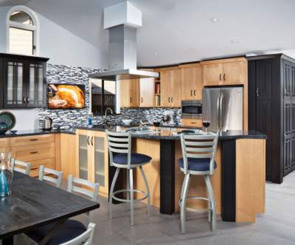 Photo By The Home Improvements Group, Inc.. Bright Kitchen With Blues And Black