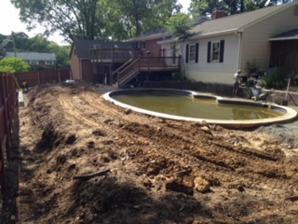 Photo By Vanguard Services Inc.. Pool Installation
