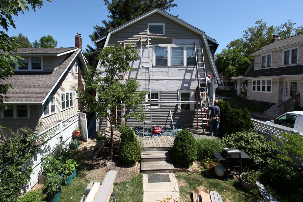 Photo By Ohio Exteriors. Odyssey 4" Clapboard Siding (Storm) With Owens Corning Estate Gray Roofing