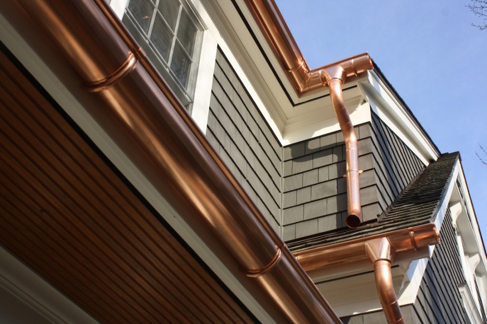 Photo By GREAT LAKES GUTTER. Half-Round Seamless Gutter