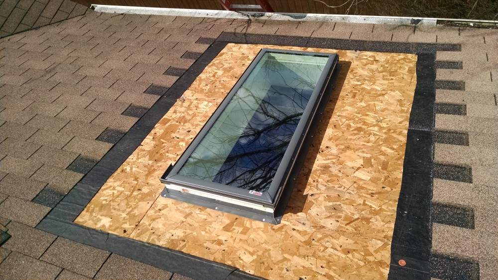 Photo By Ohio Exteriors. New Velux C08 Skylights