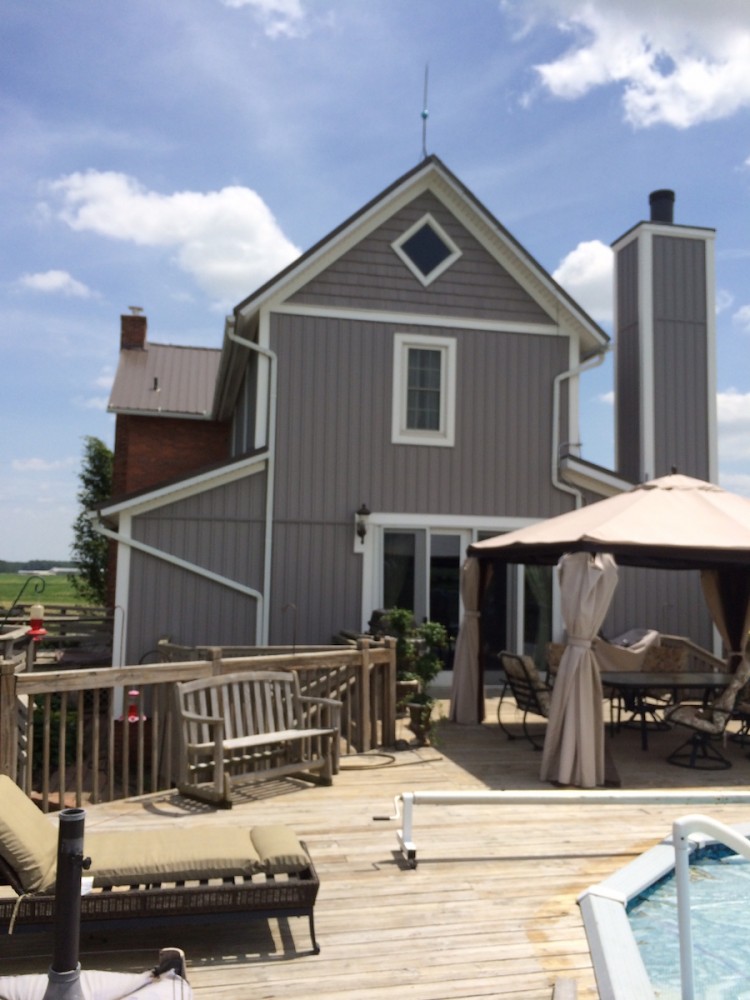 Photo By Ohio Exteriors. Mastic Board & Batten Vinyl Siding In Harbor Gray 