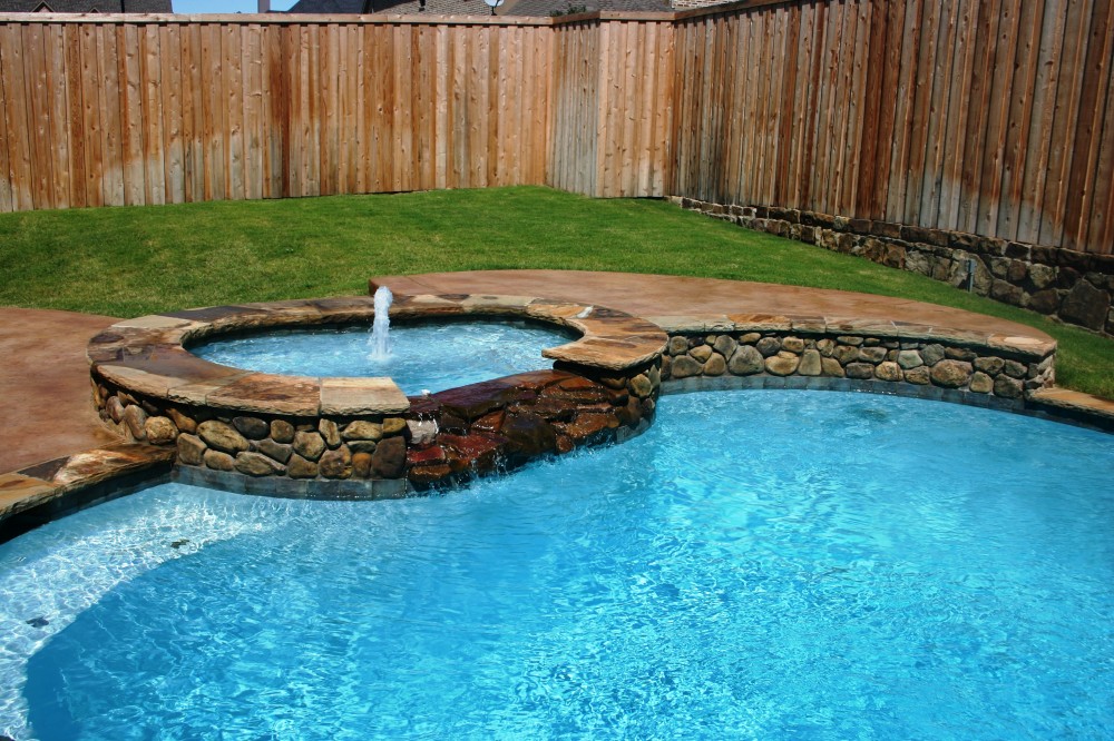 Photo By Gold Medal Pools & Outdoor Living. Spas