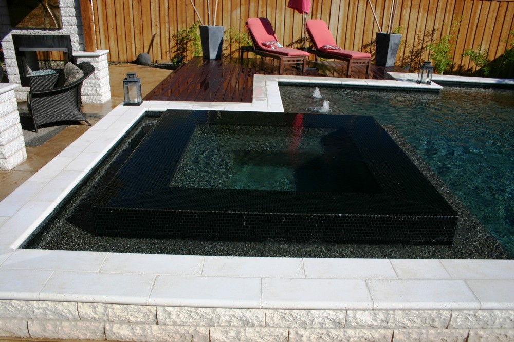 Photo By Gold Medal Pools & Outdoor Living. Spas