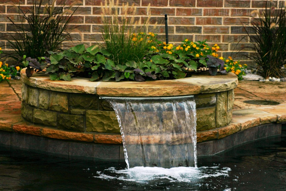 Photo By Gold Medal Pools & Outdoor Living. Water Features