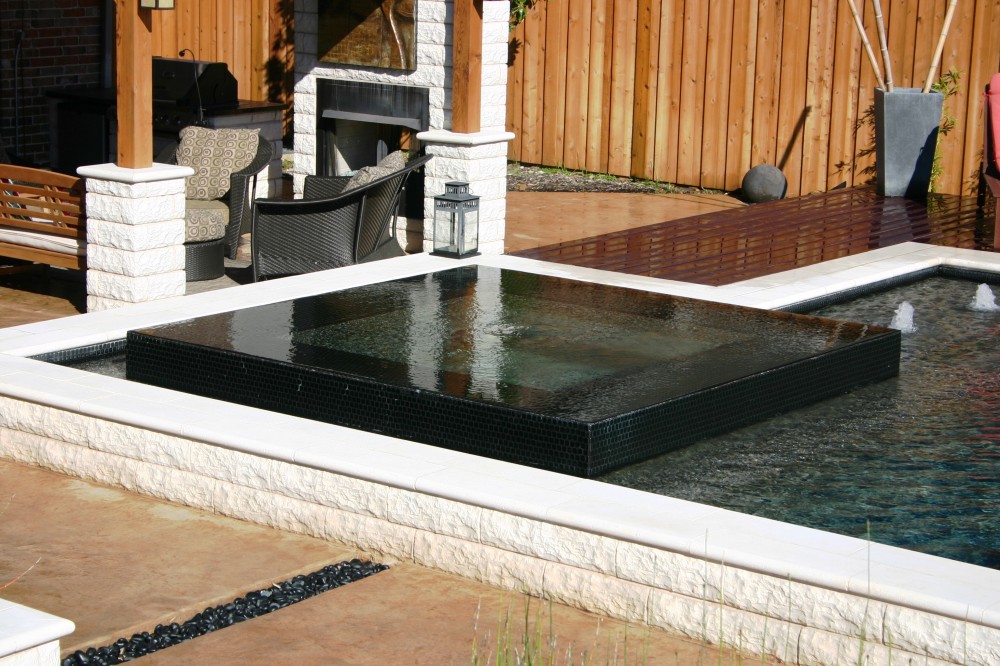 Photo By Gold Medal Pools & Outdoor Living. Water Features