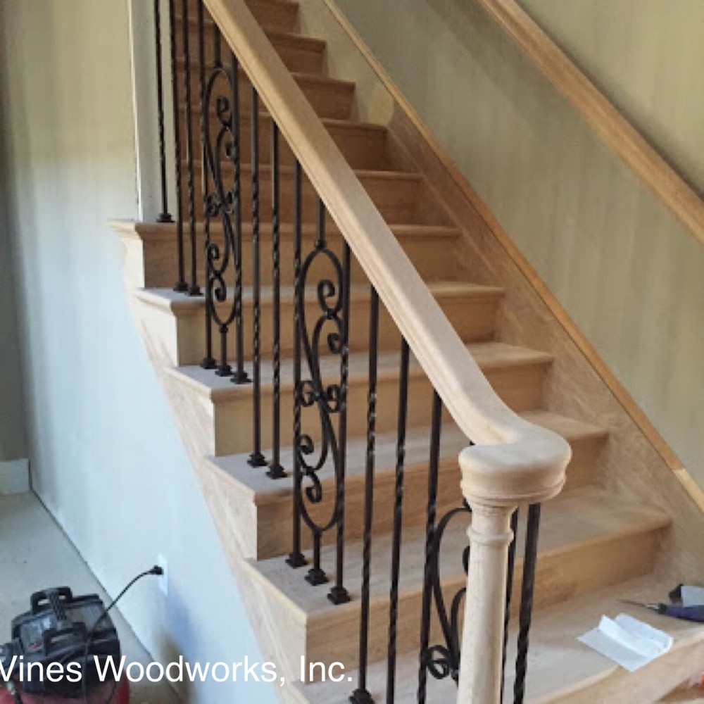 Photo By Vines Woodworks, Inc.. Custom Stairs