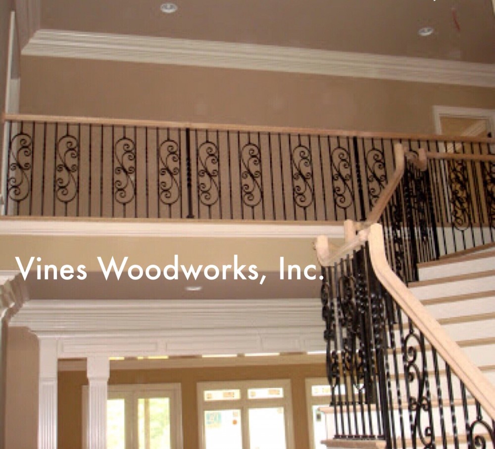 Photo By Vines Woodworks, Inc.. Custom Stairs