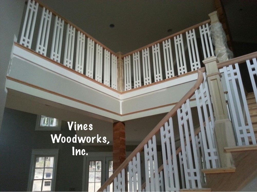 Photo By Vines Woodworks, Inc.. Custom Stairs