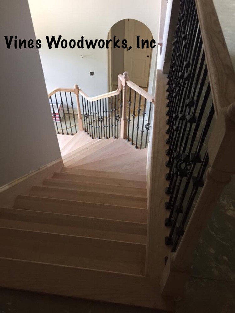 Photo By Vines Woodworks, Inc.. Custom Stairs