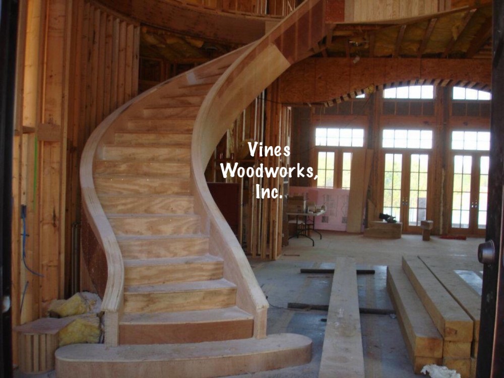 Photo By Vines Woodworks, Inc.. Custom Stairs