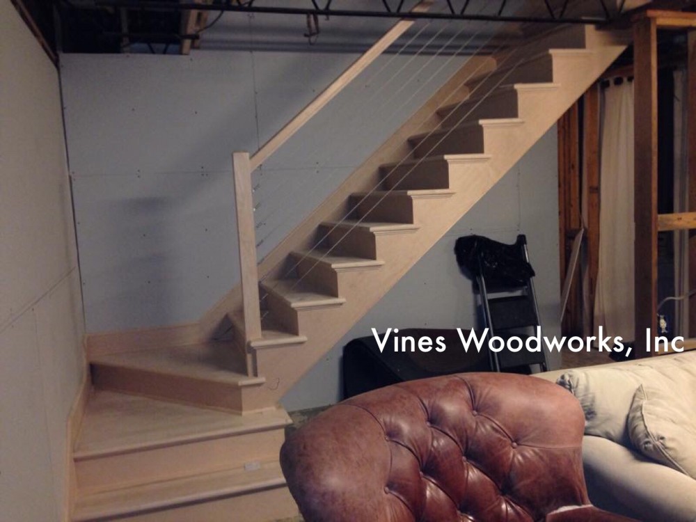 Photo By Vines Woodworks, Inc.. Custom Stairs