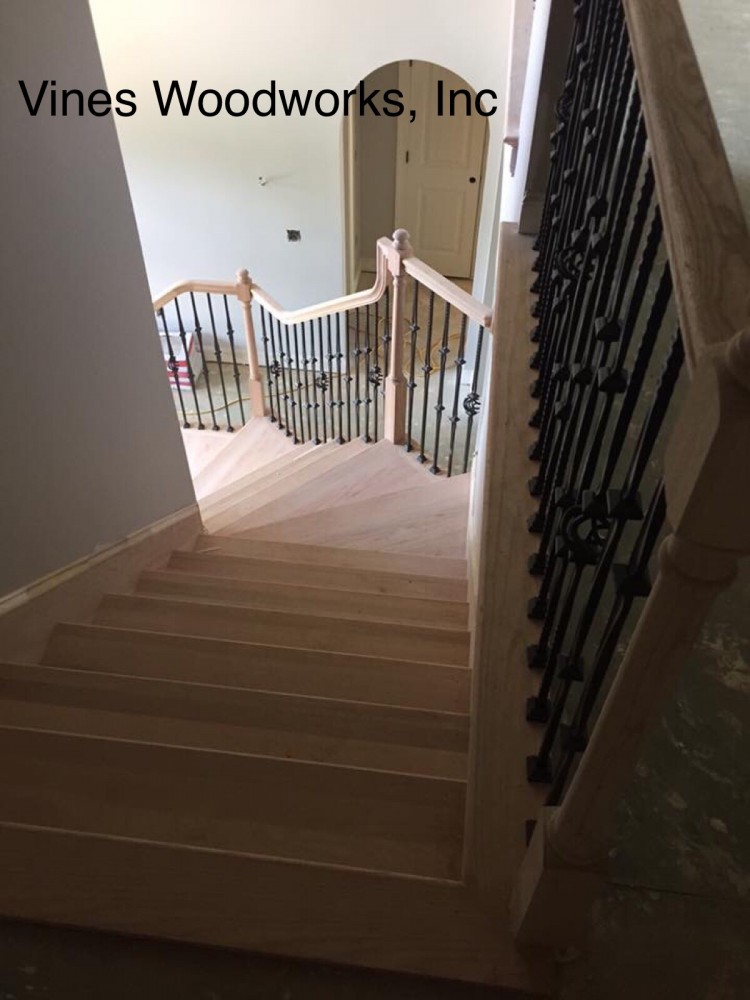 Photo By Vines Woodworks, Inc.. Custom Stairs