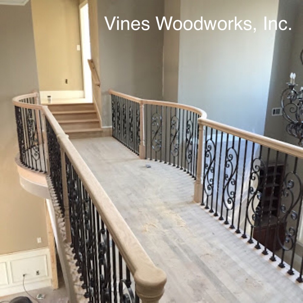 Photo By Vines Woodworks, Inc.. Custom Stairs