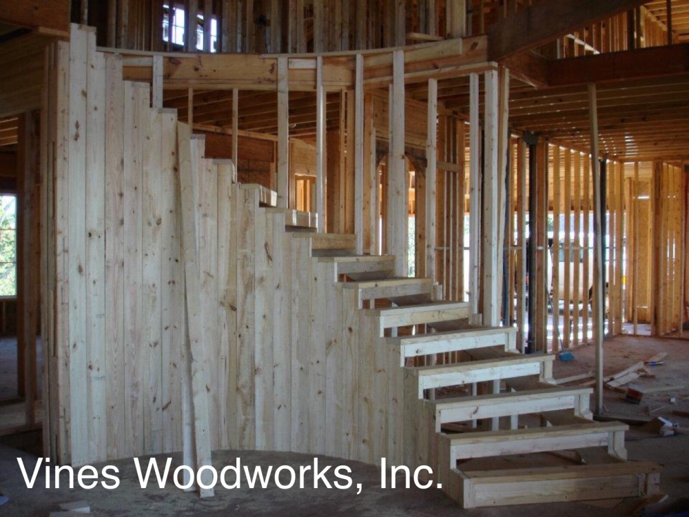 Photo By Vines Woodworks, Inc.. Custom Stairs