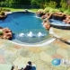 Photo by Hauk Custom Pools, LLC. Hauk Custom Pools Formal Geometric Designs - thumbnail