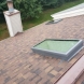 Photo by BRAX Roofing. Owens corning Duration shingle roof replacement with velux skylights - thumbnail